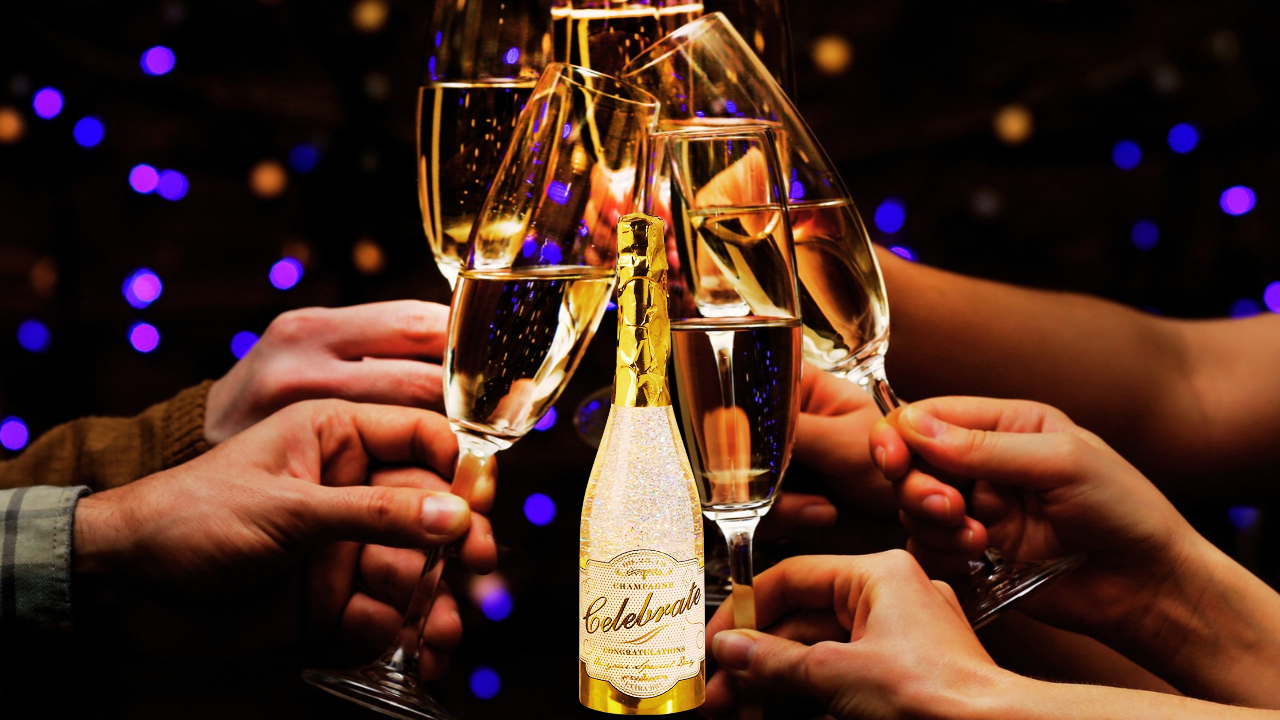 A champagne toast with the Raz Lighted Champagne Water Globe centerpiece